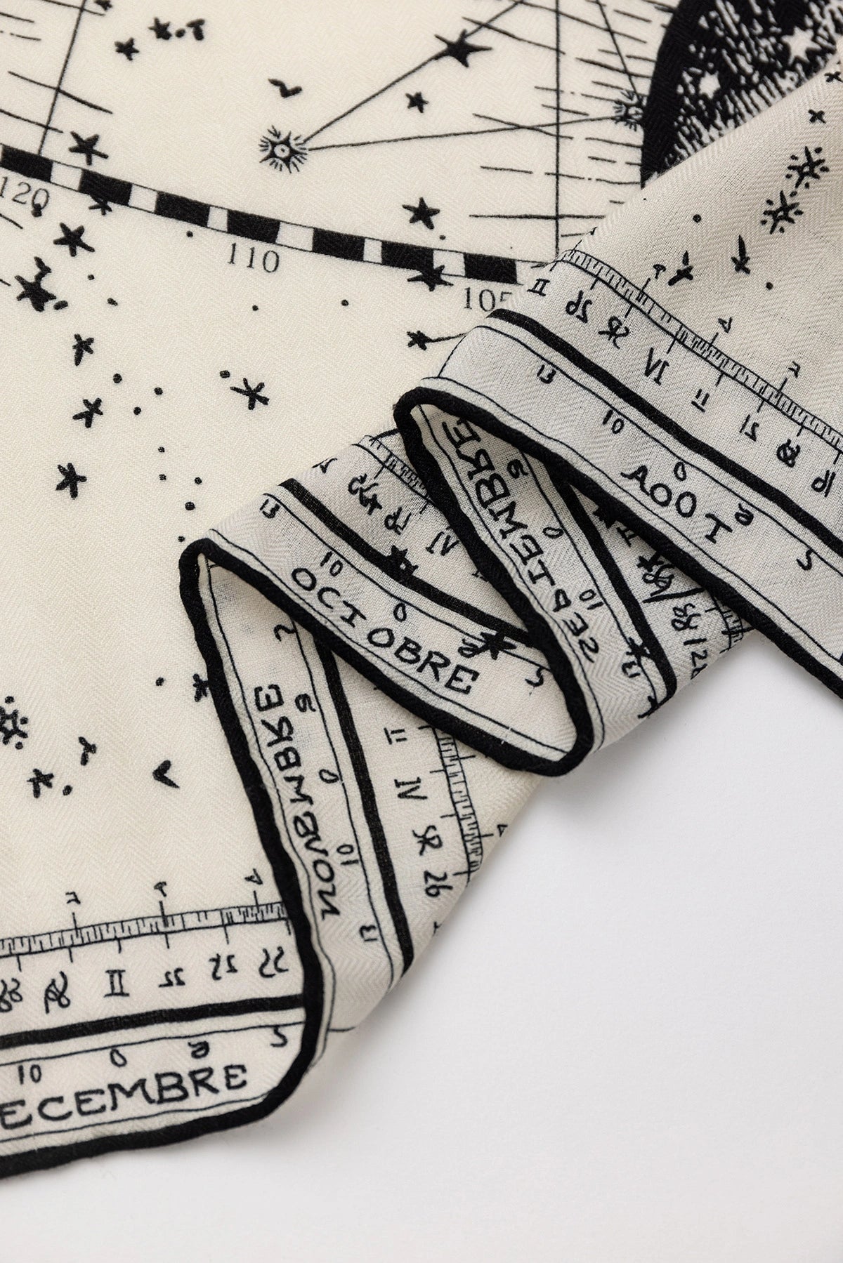 Silk Wool Square Scarf - Cosmic Star Map Print | Beige, 130*130cm, close-up of edge, showcasing detailed star and moon patterns, luxurious scarf.