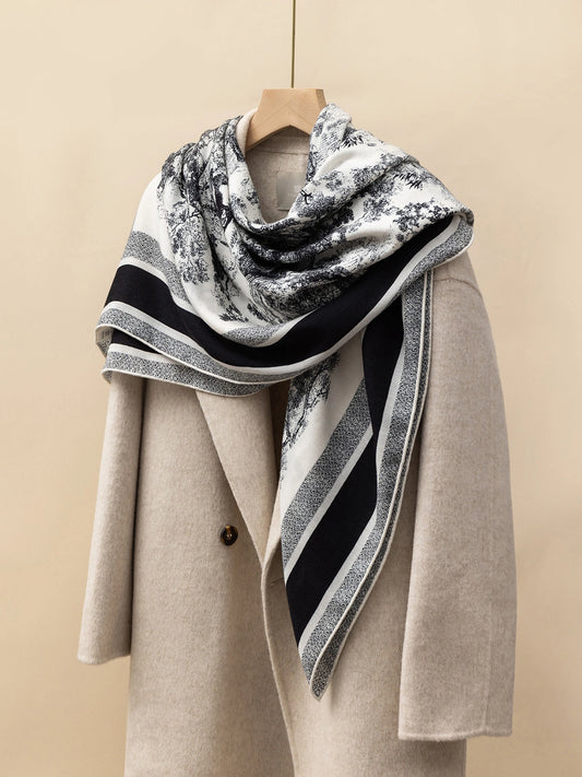 Silk Wool Square Scarf - Animal Jungle Print | Black, 130*130cm, angled on coat, highlighting jungle animal motifs, elegant fashion statement.