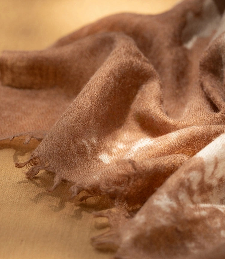 A close-up look at the luxuriously soft cashmere material of this coffee brown cashmere scarf.