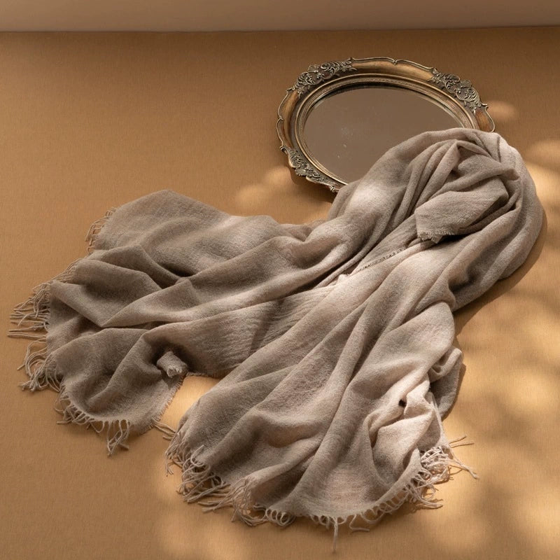 Mocha brown cashmere scarf, showcasing its luxurious texture and versatile oversized design.