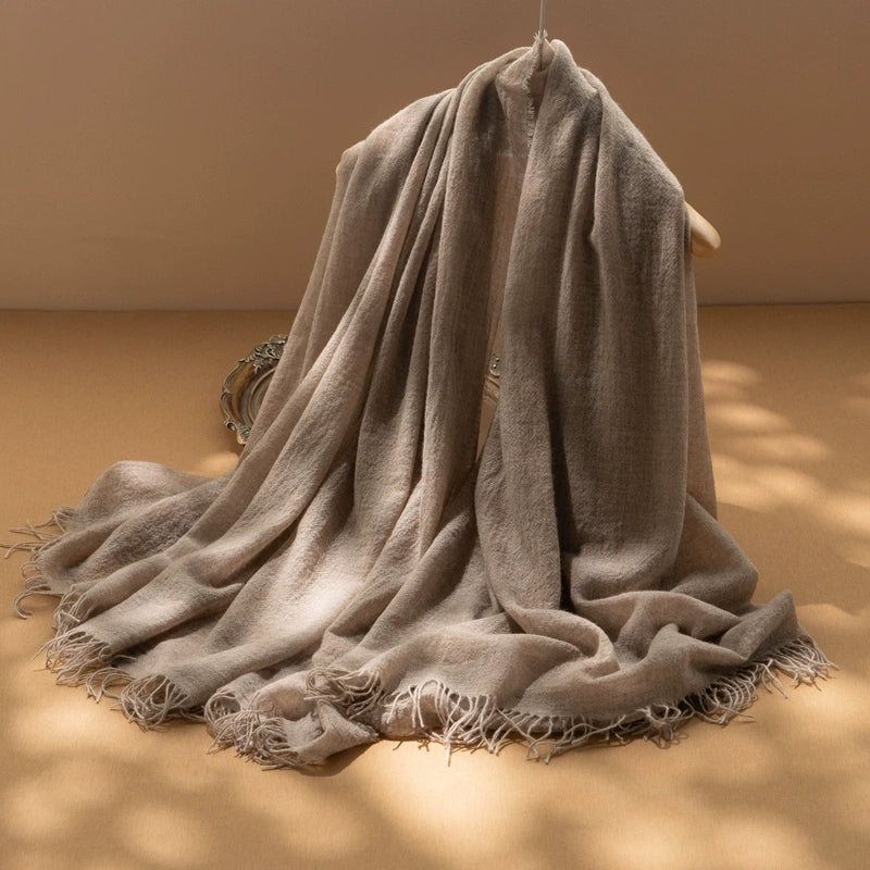 Mocha brown oversized cashmere scarf, showcasing its soft texture and elegant drape.
