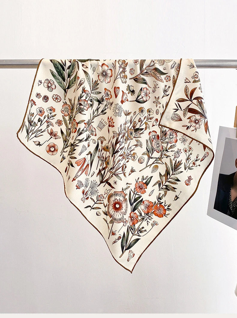 Woman wearing elegant vintage floral silk wool square scarf
