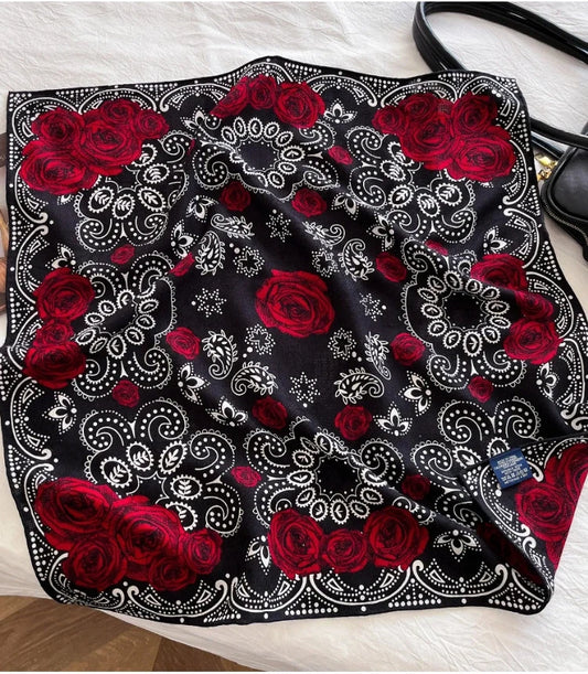Black silk wool square scarf with red rose and paisley print flat lay