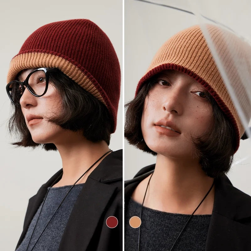 Rust brown and camel reversible wool beanie modeled with each side facing outward.