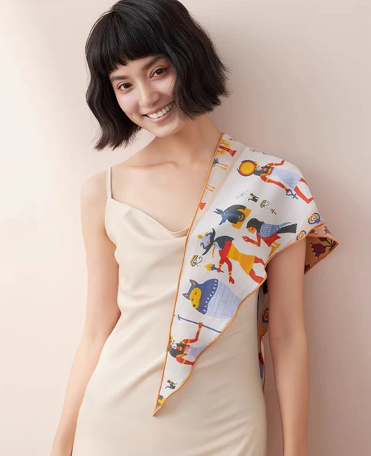 Tribal pattern silk scarf draped on shoulder, lightweight mulberry silk scarf styling