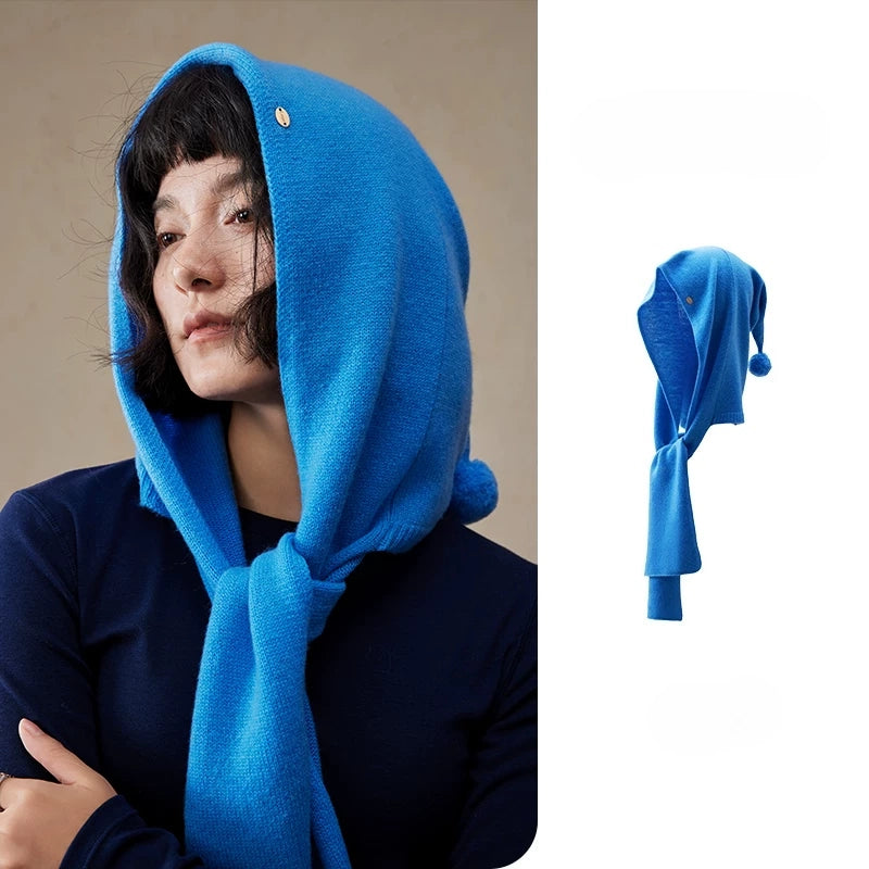 Women's royal blue wool hooded scarf styled with a navy top, with product detail view