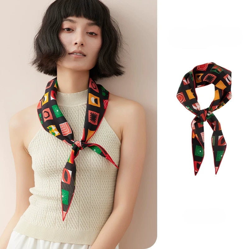 Geometric mulberry silk triangle scarf styled as a neck scarf, elegant vintage print accessory