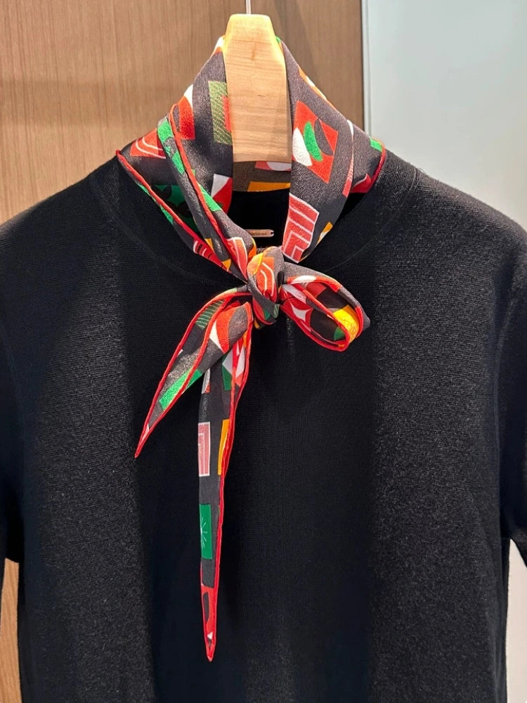 Geometric silk scarf styled on knitwear, elegant triangle neck scarf in mulberry silk