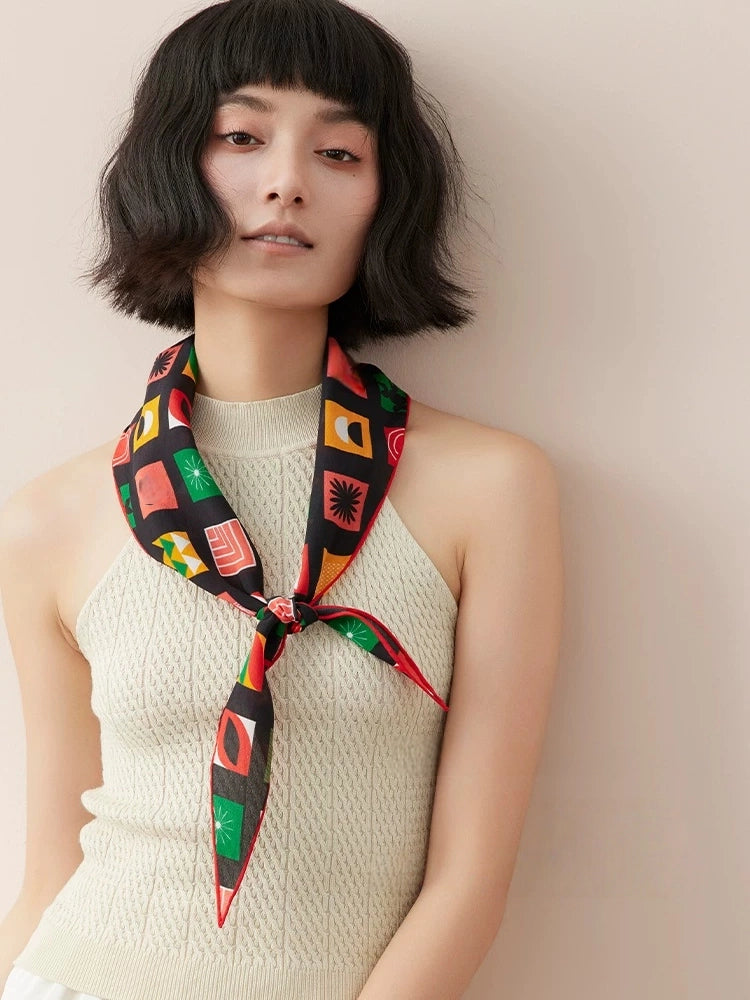 100% mulberry silk triangle scarf worn as a silk neck scarf, geometric retro styling