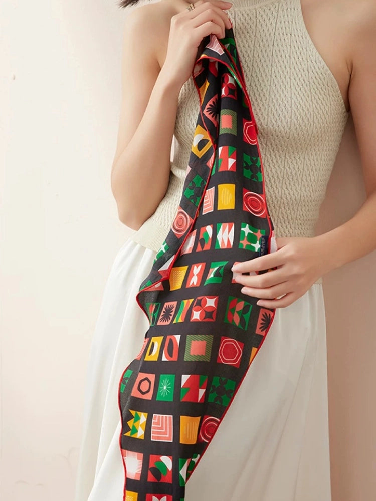 Geometric mulberry silk scarf fully unfolded, triangle silk scarf fabric detail