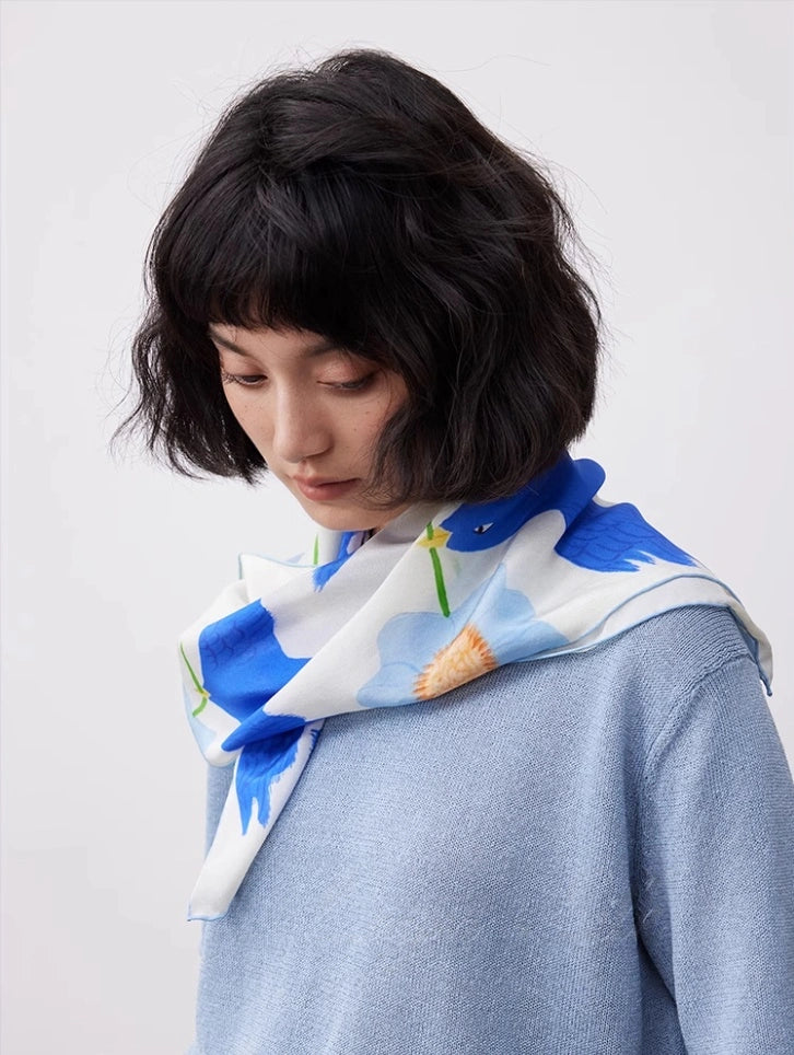 Blue bird flower mulberry silk square scarf tied softly around the neck