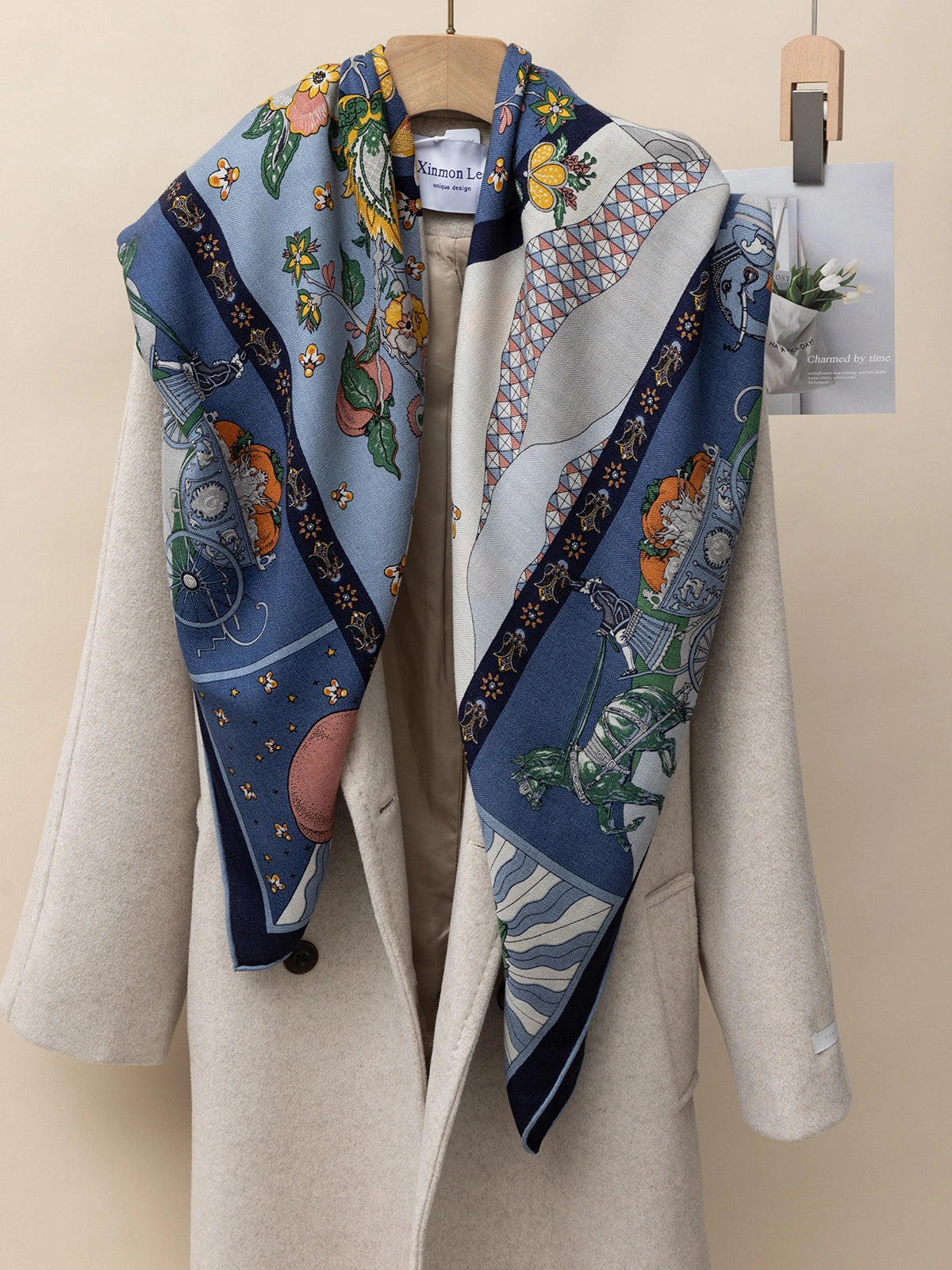 Silk Wool Square Scarf - Persimmon Tree Print | Blue, 130*130cm, draped on a coat, showcasing vibrant floral and carriage patterns, stylish accessory. 