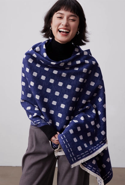 Navy blue brushed silk wrap for women styled as an oversized warm silk scarf with geometric pattern