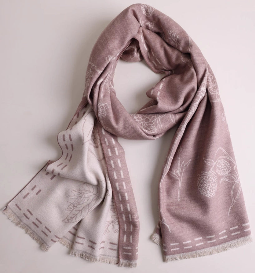 Pale pink large brushed silk scarf displayed in a soft draped shape with delicate floral pattern