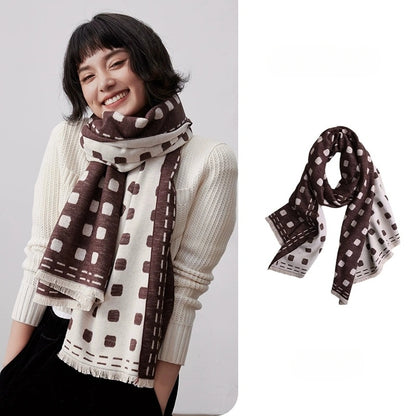 Brown polka dot large brushed silk scarf styled with a cream sweater for elegant everyday wear