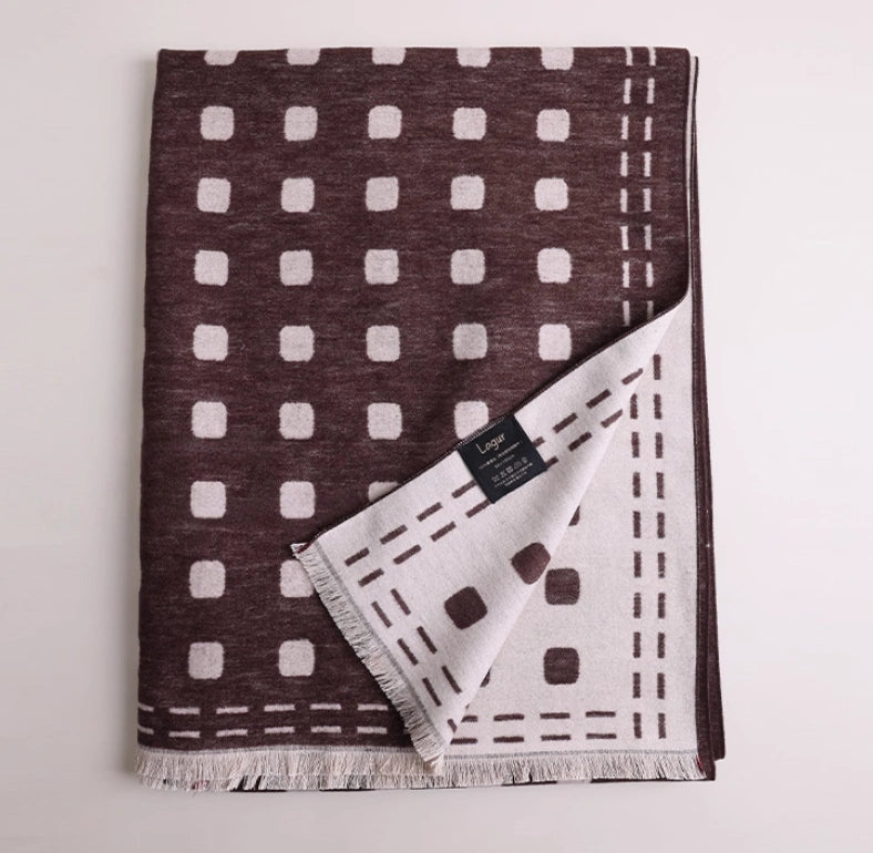 Folded brown and ivory large brushed silk scarf with geometric dot pattern and soft fringed edge