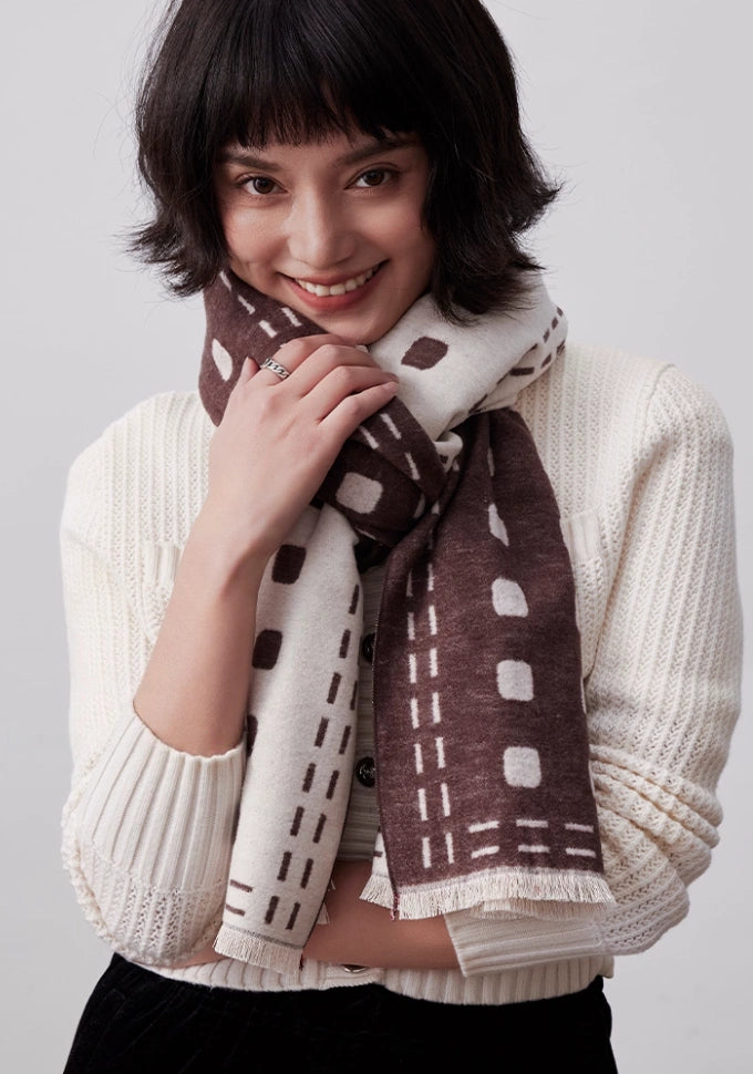 Brown and ivory mulberry silk scarf worn around the neck with a warm brushed finish for everyday elegance