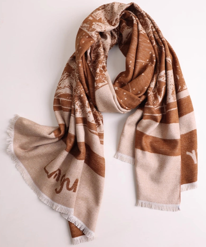 Brown and ivory brushed silk scarf displayed in a soft draped shape with warm artistic pattern