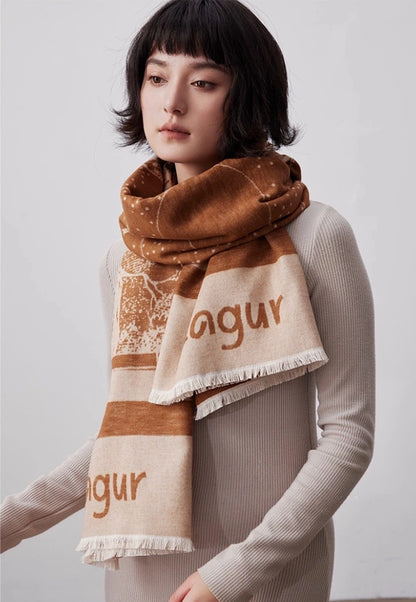 Brown brushed silk scarf styled as a cozy neck wrap with soft mulberry silk texture and fringed edge