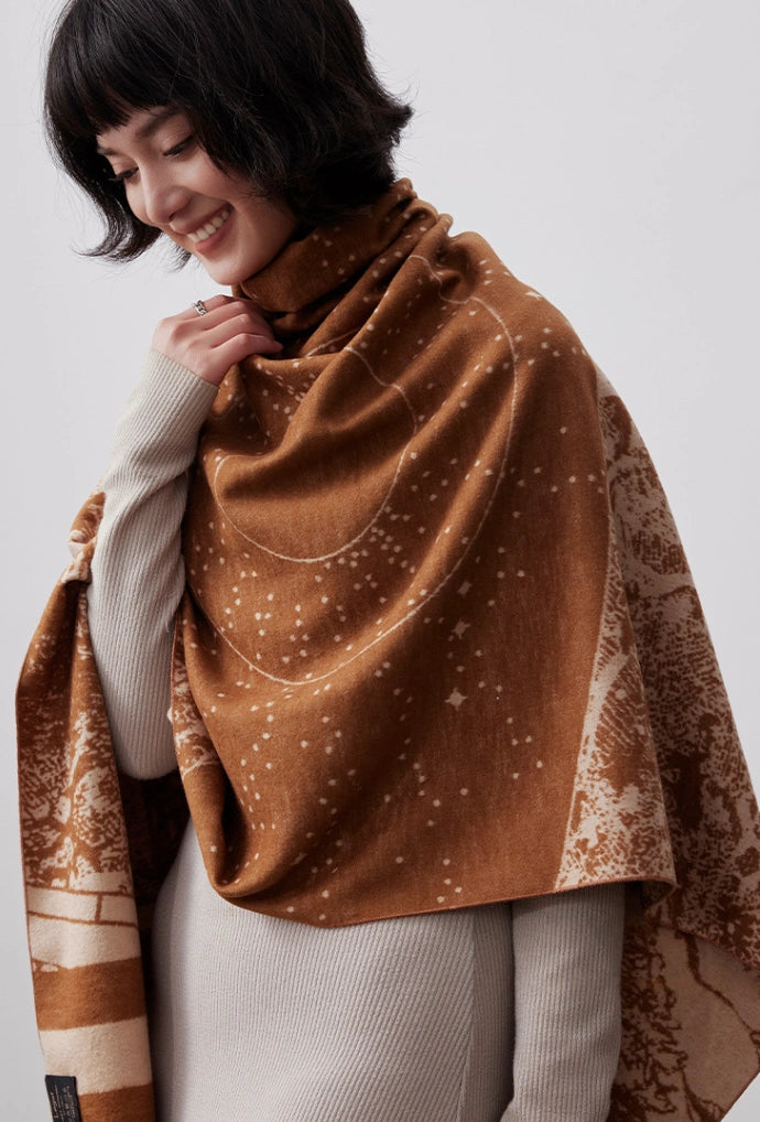 Warm brown large silk shawl with brushed finish styled as an elegant oversized winter wrap