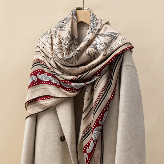 Silk Wool Square Scarf - Nautical Fantasy Print | Burgundy, draped on a beige coat, showcasing nautical and fantasy designs.