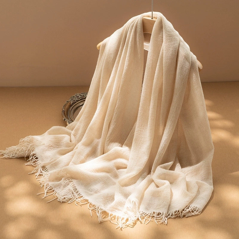 Champagne beige oversized cashmere scarf, 100% pure cashmere, styled as a luxurious wrap for women.