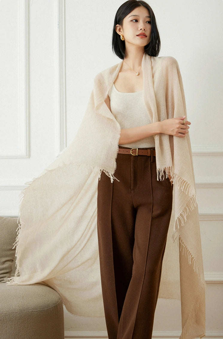 Champagne beige oversized cashmere scarf, styled elegantly for a minimalist look.