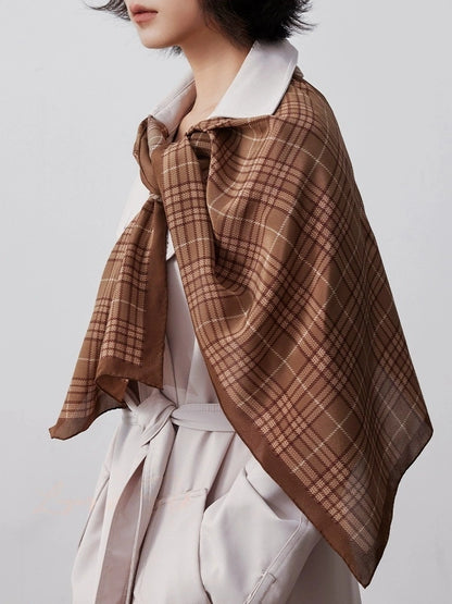 Coffee plaid silk scarf styled as a soft shoulder wrap