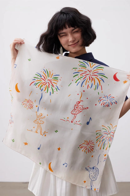 White fireworks ballerina silk square scarf displayed open to show the colorful artistic pattern