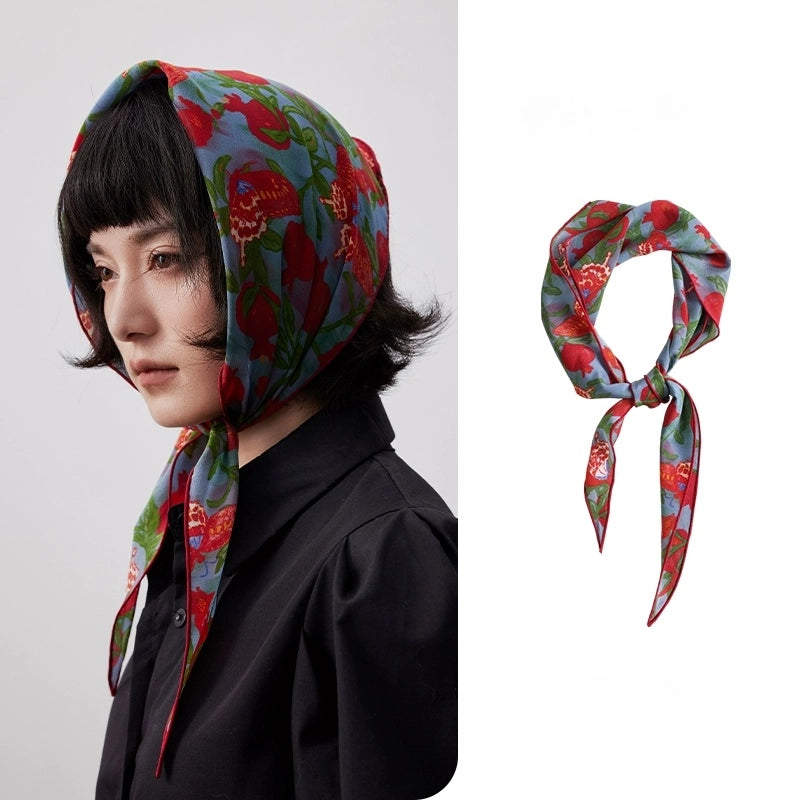 Lupine blue pomegranate butterfly triangle silk scarf styled as a head scarf