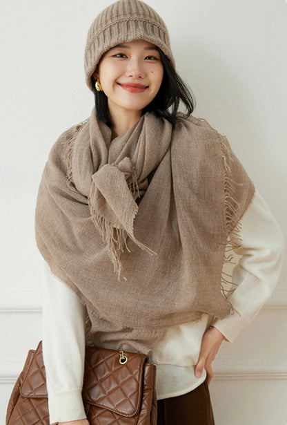 Mocha brown oversized cashmere scarf, styled as a chic shawl for women.