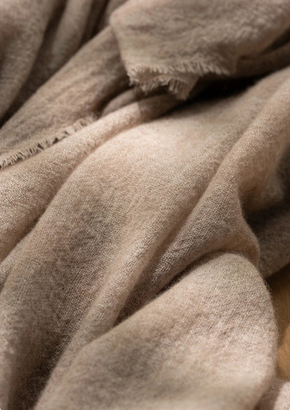 Mocha brown cashmere scarf, showcasing its breathable and lightweight cashmere fabric.