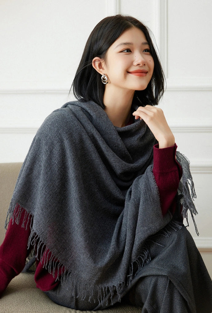 Modern grey oversized cashmere scarf, 100% pure cashmere, styled as a versatile wrap.