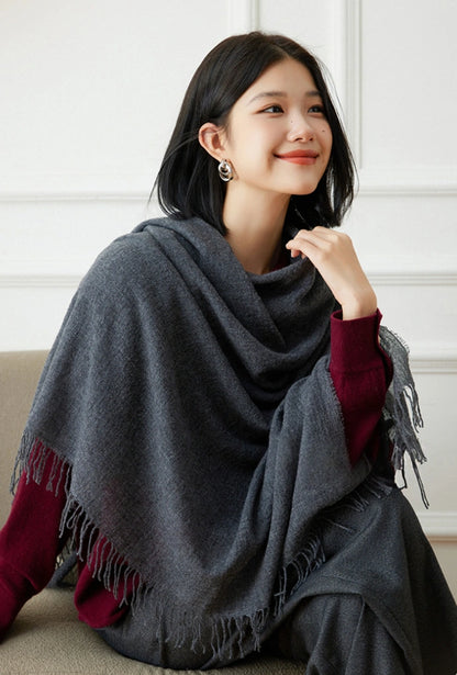 Modern grey oversized cashmere scarf, 100% pure cashmere, styled as a versatile wrap.