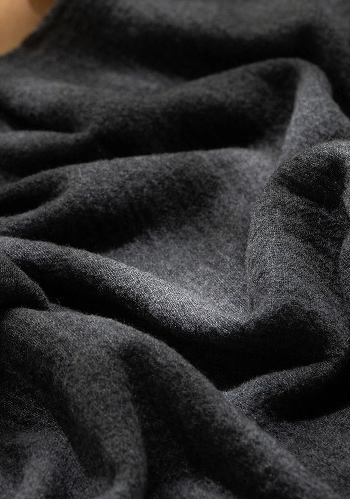 Modern grey cashmere scarf, showcasing its breathable and lightweight cashmere fabric.