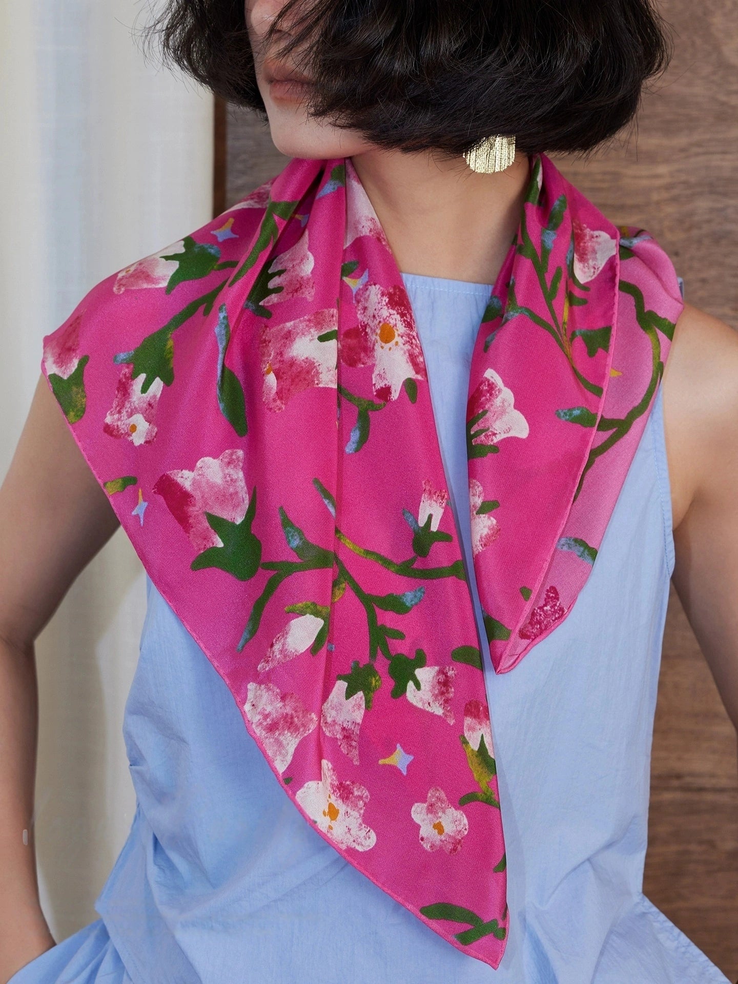 Berry Powder silk square scarf styled as a neck accessory, demonstrating its charm and versatility.