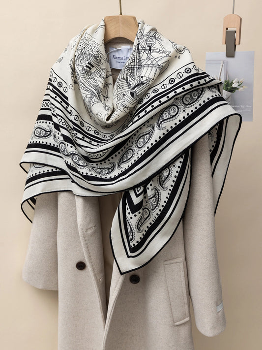Silk Wool Square Scarf - Nautical Fantasy Print | Off-White, draped on a beige coat, showcasing nautical and fantasy designs.
