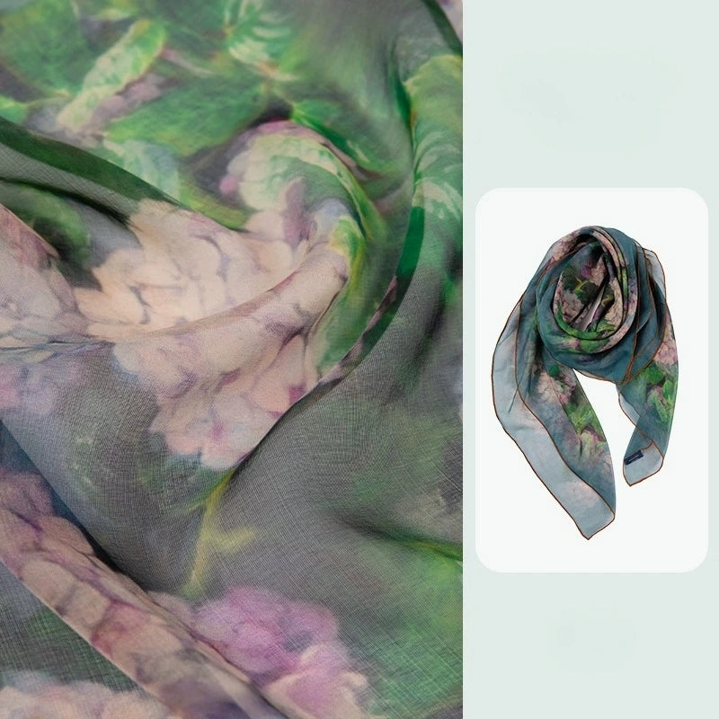 Plant-dyed floral silk square scarf with green and pink artistic pattern detail