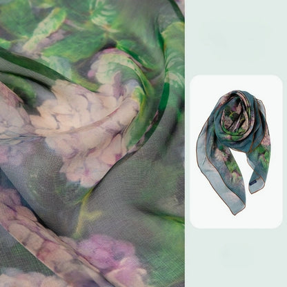 Plant-dyed floral silk square scarf with green and pink artistic pattern detail