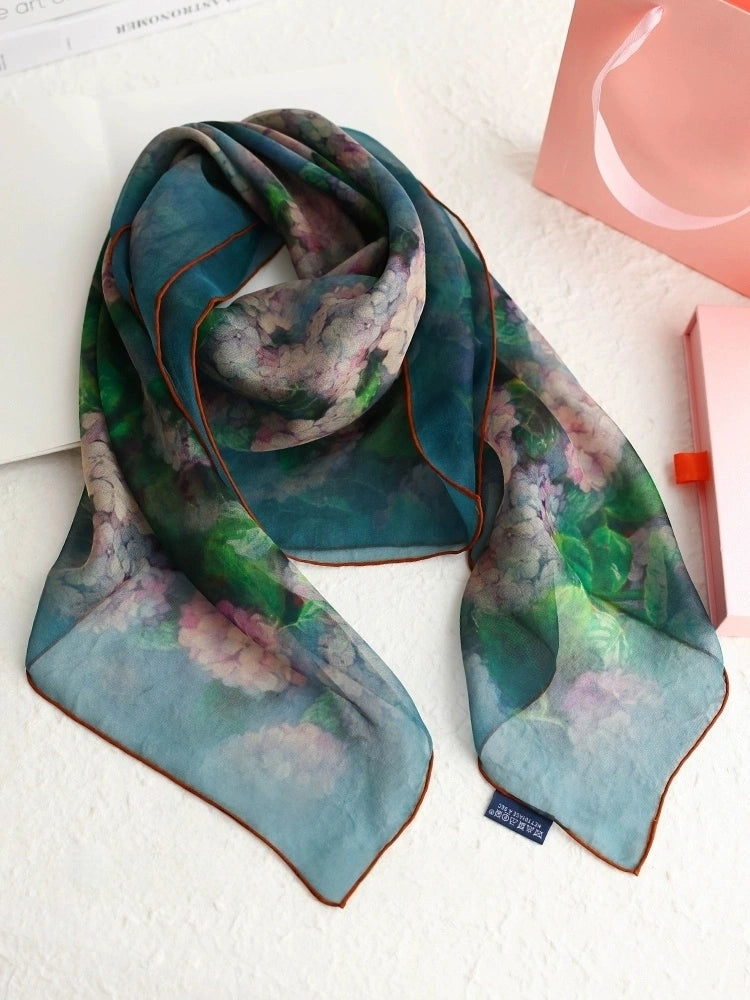 Green floral mulberry silk square scarf displayed flat to show soft drape