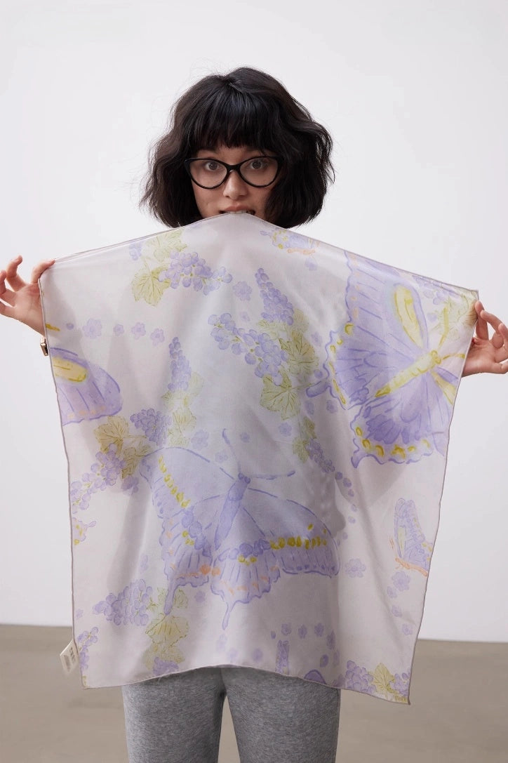 Purple butterfly silk square scarf displayed open to show the full floral butterfly pattern