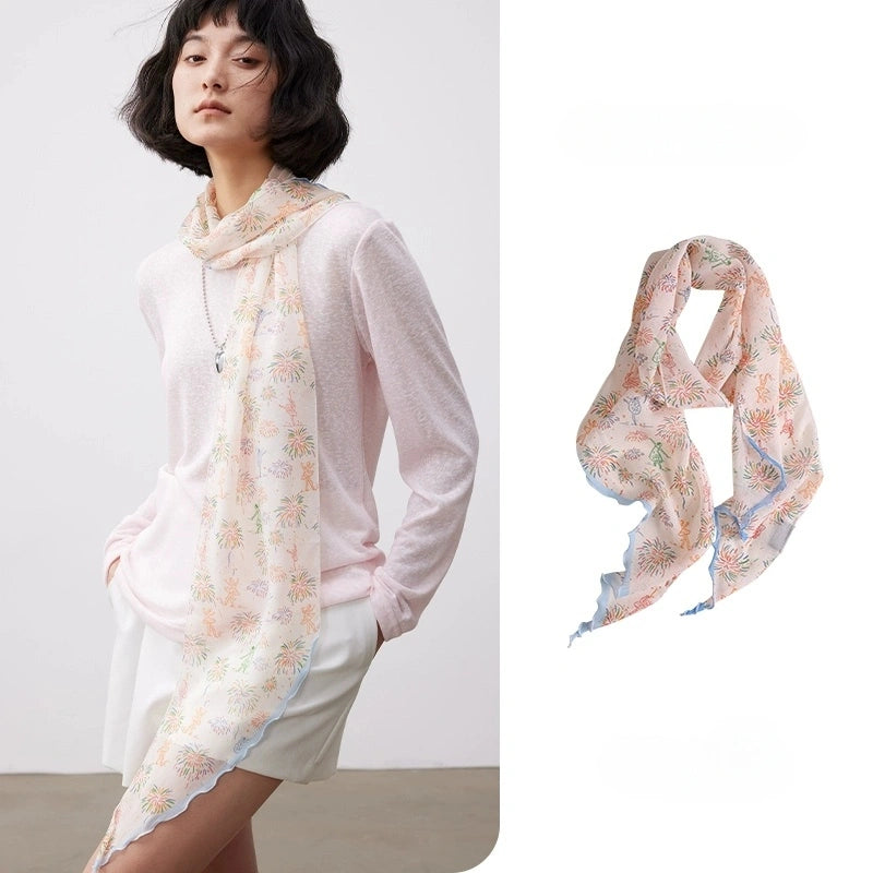 White fireworks skinny silk scarf made from 100% mulberry silk, styled as a lightweight neck scarf with product detail view