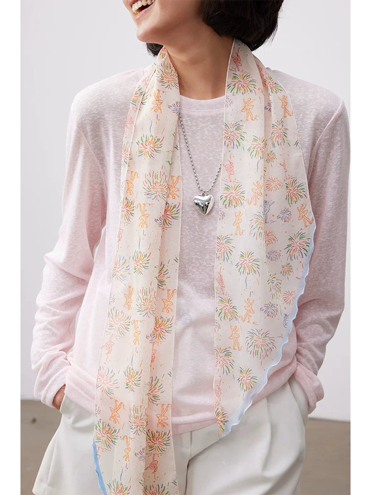 White fireworks silk skinny scarf shown in front view with lightweight drape and elegant styling