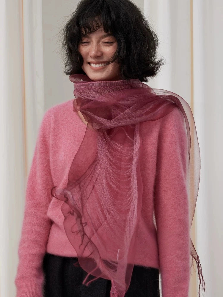 Berry mulberry silk scarf styled loosely around the neck with flowing fringed ends