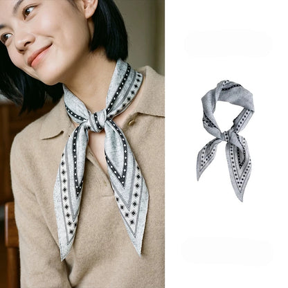 Black and gray geometric silk wool diamond scarf tied at the neck, with product view