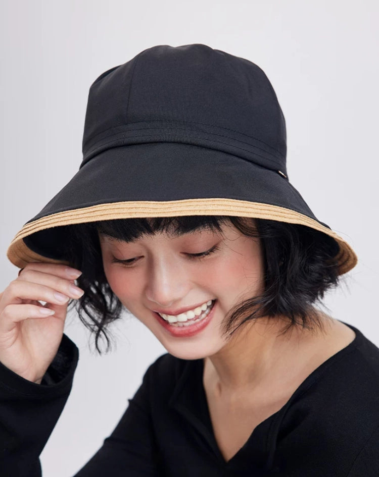 black wide brim sun hat for women with soft fabric crown and summer resort style