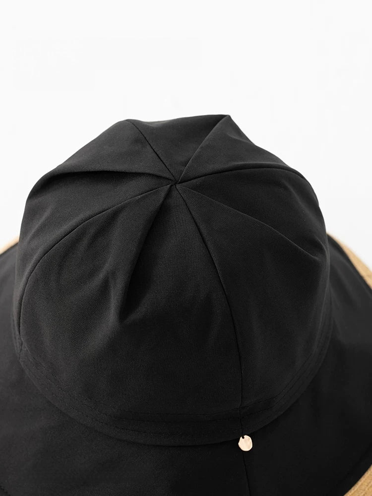 top view of black foldable wide brim sun hat with soft fabric crown