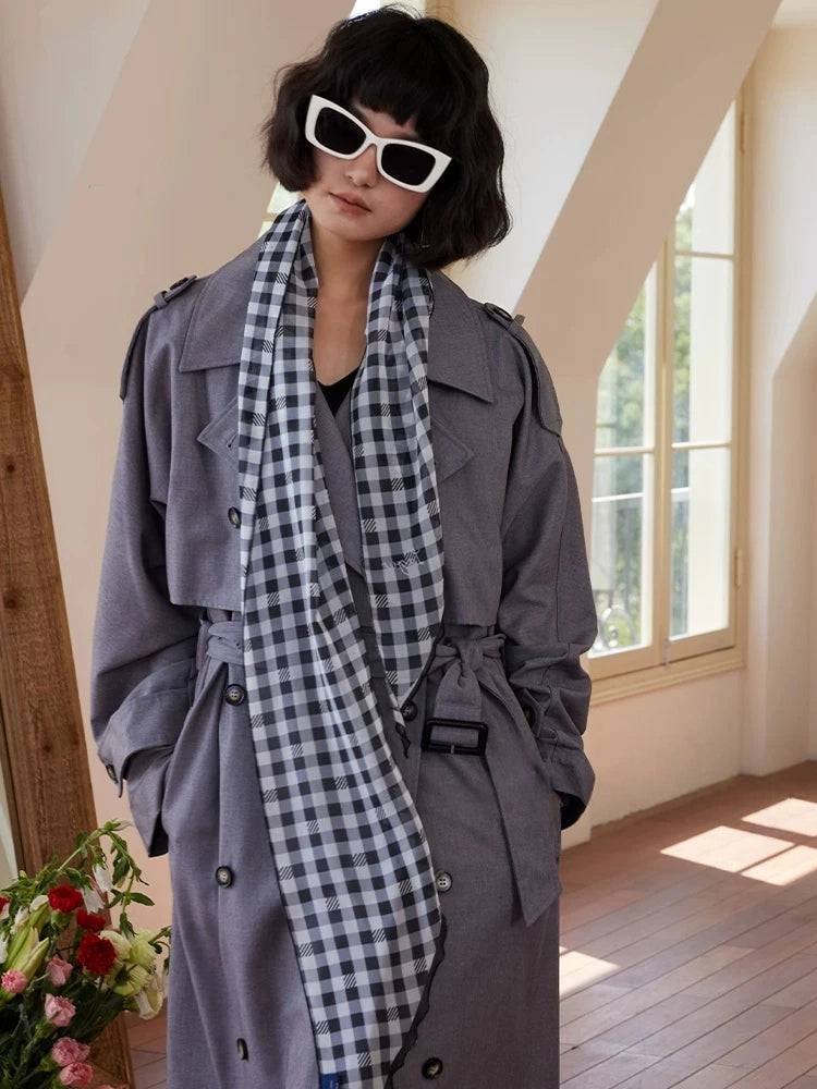 Black white gingham mulberry silk twilly scarf worn as an elegant neck ribbon for classic everyday styling