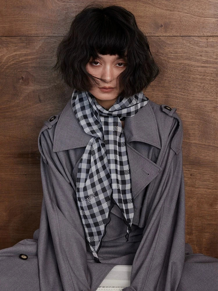 Black and white gingham skinny silk scarf styled as a soft neck scarf with relaxed French-inspired outfit