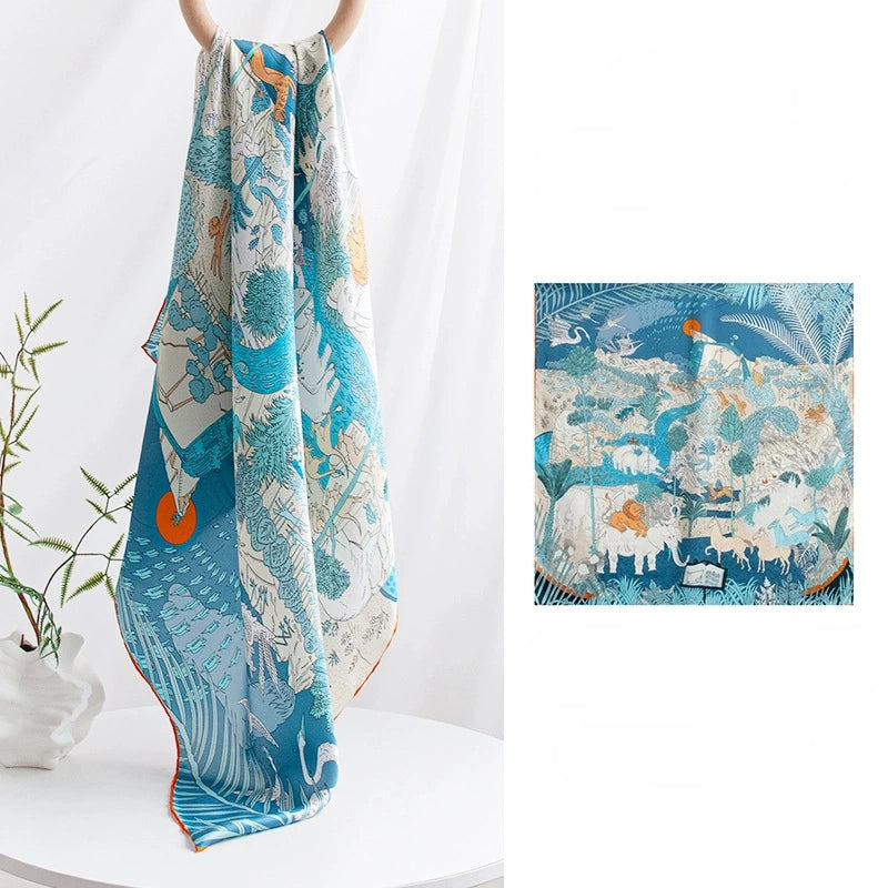 Blue animal kingdom silk square scarf made from 100% mulberry silk with an elegant artistic wildlife print.